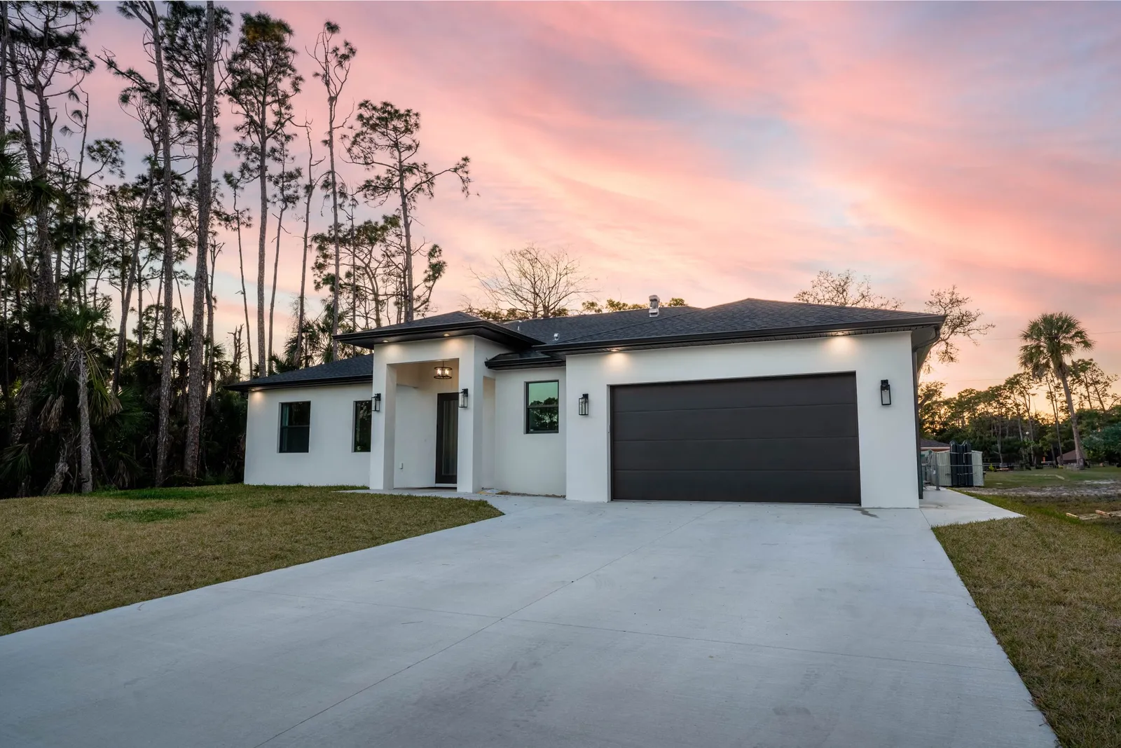 Custom home exterior at sunset in Southwest Florida