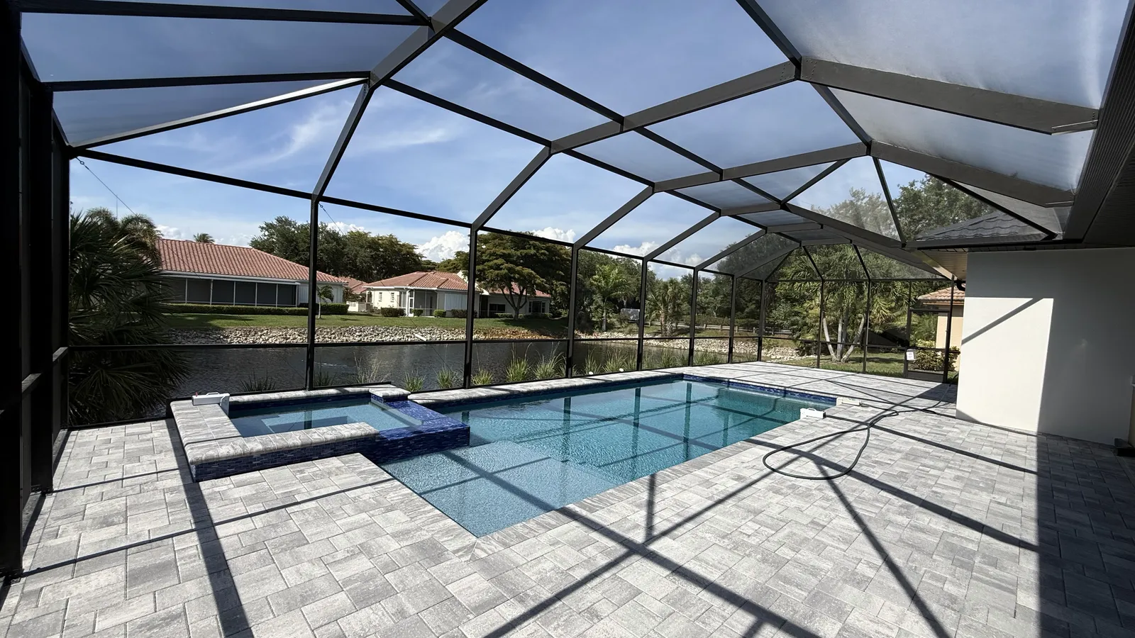 Screened pool lanai of a custom-built Florida home